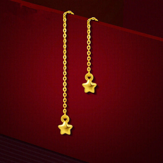 Gold star long earrings